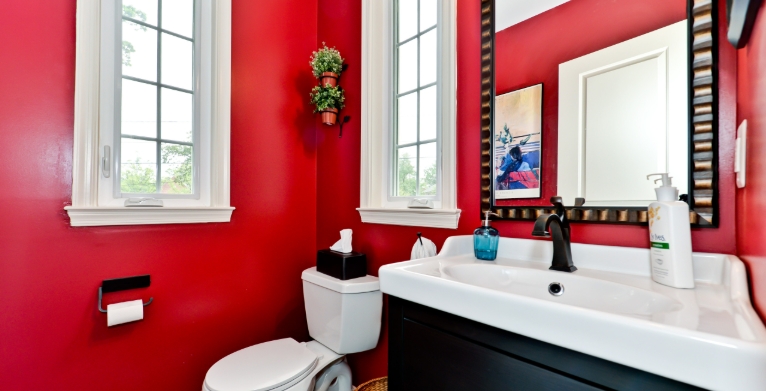 red bathroom wall art